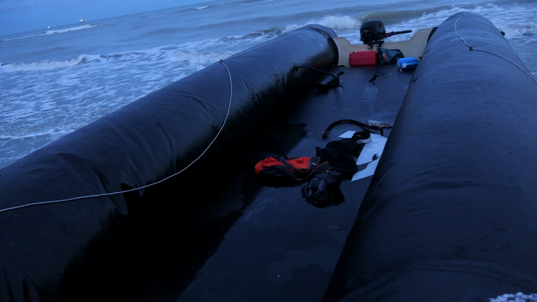 The punctured dinghy pulled into shore