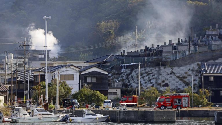 One killed and 170 properties broken or destroyed as fireplace burns in Japan 2 Smoke rises from a residential area of the southwestern Japan city of Oita in the morning of 19 November. Pic: AP