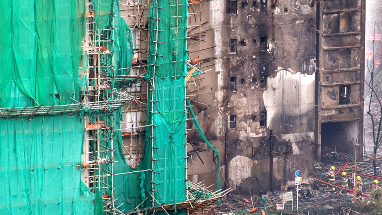 Charred bamboo and plastic mesh covers the complex, which was undergoing renovation works. Pic: Reuters