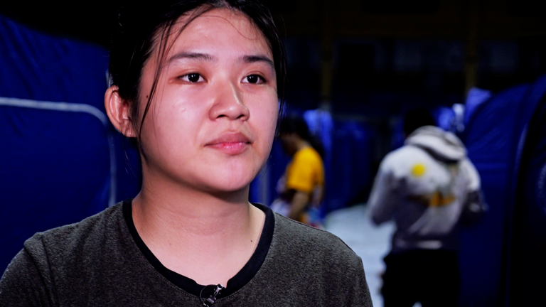 Marie Yukie Fronda escaped, carrying her one-year-old baby