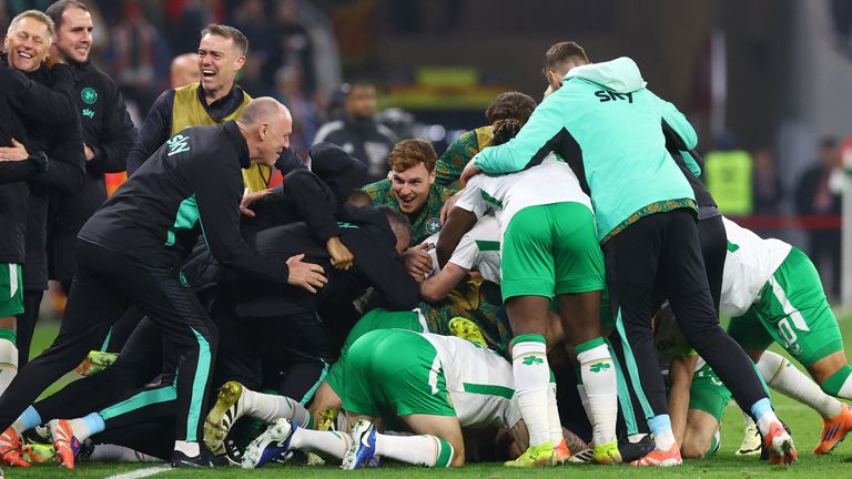 The Republic of Ireland's players celebrate the winning goal against Hungary that put them into the play-offs. Pic: Reuters