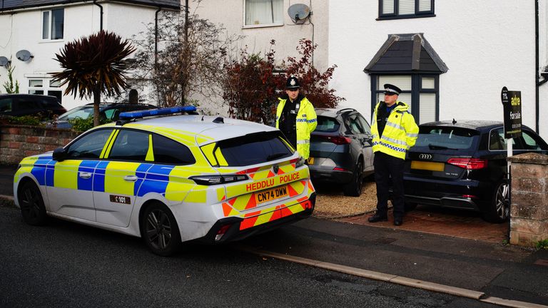 Police at the scene in Crossways, Rogiet, southeast Wales, where a nine-month-old baby died after a dog attack. Pic: PA