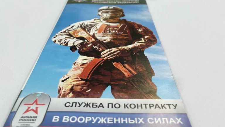 A Russian military information leaflet is left in the arena