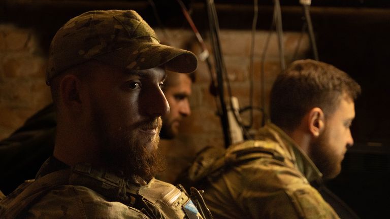 Betsik observes the work of the team on in the cellar