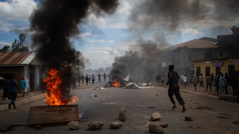 People protest in the streets of Arusha, Tanzania, on election day Wednesday. Pic: AP