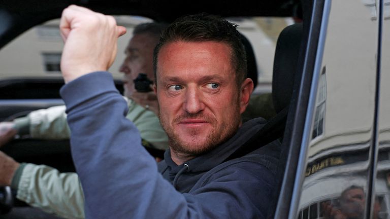 Tommy Robinson is driven away after his acquittal. Pic: Reuters