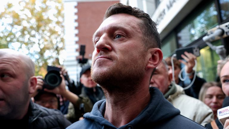 Tommy Robinson leaves court after being acquitted of charges under the Terrorism Act. Pic: Reuters