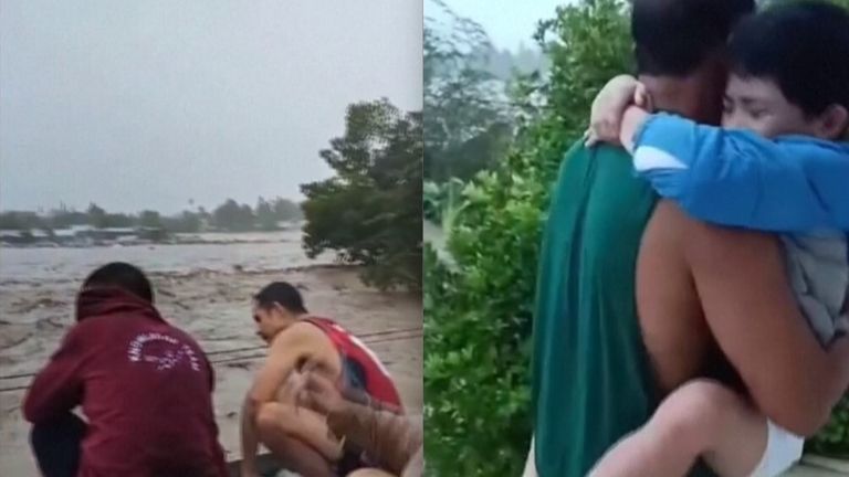 Filipinos gather on roofs for safety after a deadly typhoon