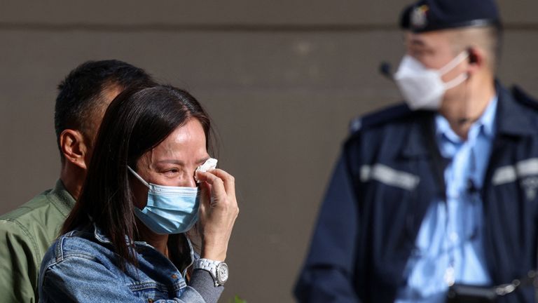 A relative of a resident at the scene. Pic: Reuters