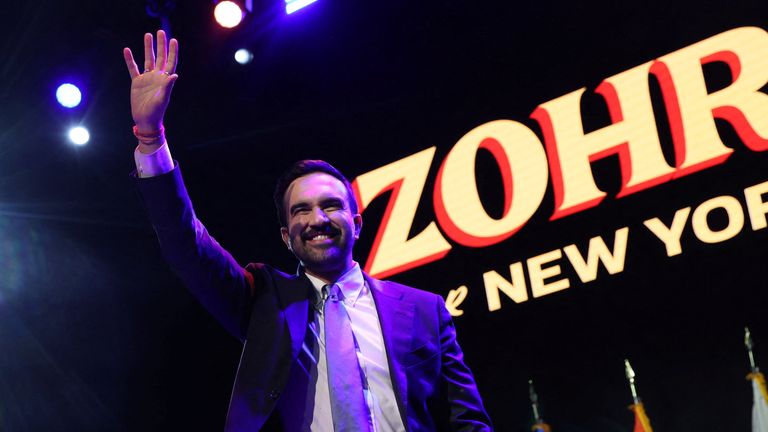 Zohran Mamdani waves on stage after winning the 2025 New York City Mayoral race. Pic: Reuters