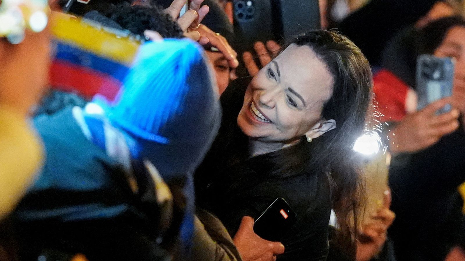 In-hiding peace prize winner makes emotional appearance after unprecedented journey