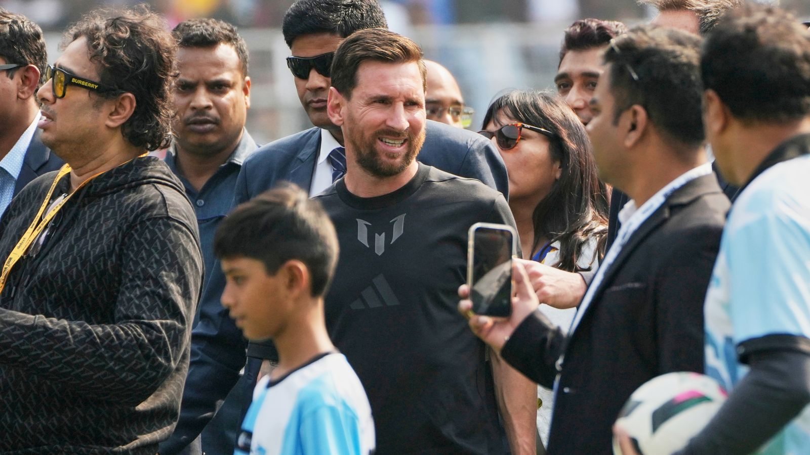 Angry Messi fans rip up seats and invade pitch as star begins India tour