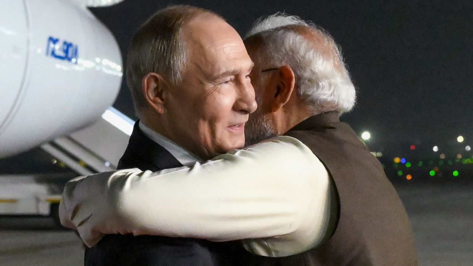 Narendra Modi and Vladimir Putin embrace before talking trade at India-Russia summit