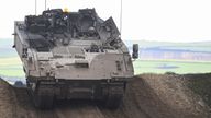 An Ajax armoured vehicle takes part in trials and development tests at Bovington Camp.