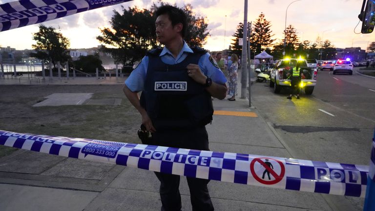 Police cordon off an area at Bondi Beach after the shooting. Pic: AP