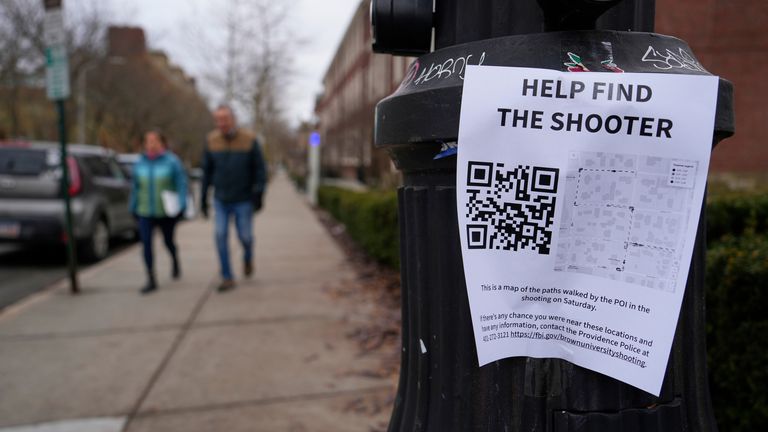 A poster seeking information about the Brown University shooting suspect. Pic: AP
