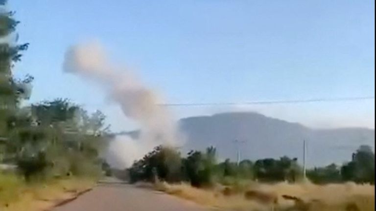Smoke rises from the site, after Thailand launched air strikes along its disputed border with Cambodia.
Pic: Reuters