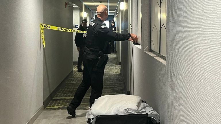 Police taping off hotel rooms following the arrest. Pic: AP