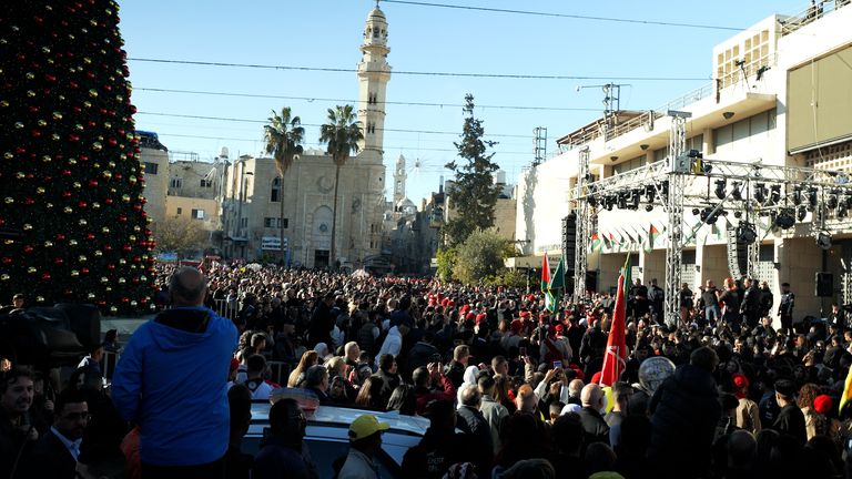 Crowds gather to celebrate Christmas in Manger Square