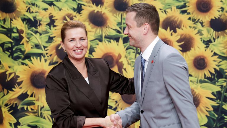 Denmark's Prime Minister Mette Frederiksen (left) greets Greenland's Prime Minister, Jens-Frederik Nielsen.