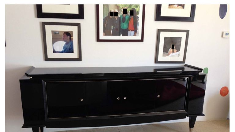 A photo released in the Epstein files shows Bills Gates's picture framed above a cabinet. Pic: @OversightDems