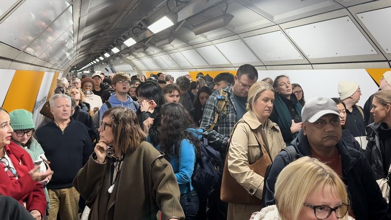 Elizabeth Line passengers queuing to exit Heathrow T2/3 