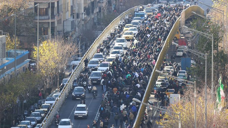Protesters march in Tehran. Pic: Fars News Agency/AP