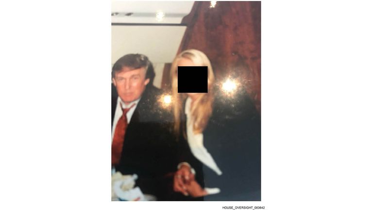 Mr Trump with an unidentified woman. Pic: @OversightDems