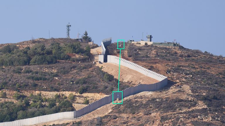 A newly-constructed portion of Israel's border wall is seen crossing into Lebanon, with border posts highlighted. Pic: AP