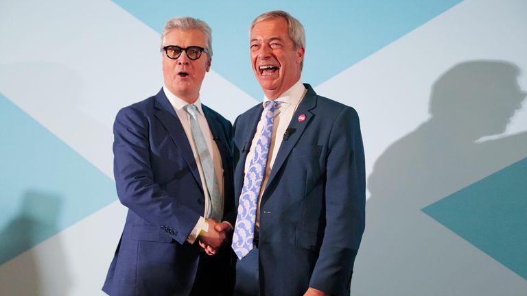 Reform UK leader Nigel Farage (right) at the MacDonald Inchyra Hotel & Spa in Falkirk, with Lord Malcolm Offord who was announced by Nigel Farage as the latest defector to join the party during the rally in Falkirk. Picture date: Saturday December 6, 2025.