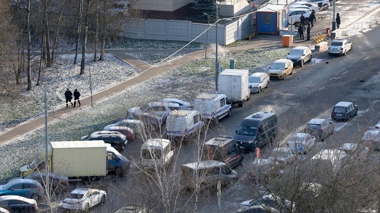 Officers at the scene where two police officers and another person were killed. Pic: Reuters/Ramil Sitdikov