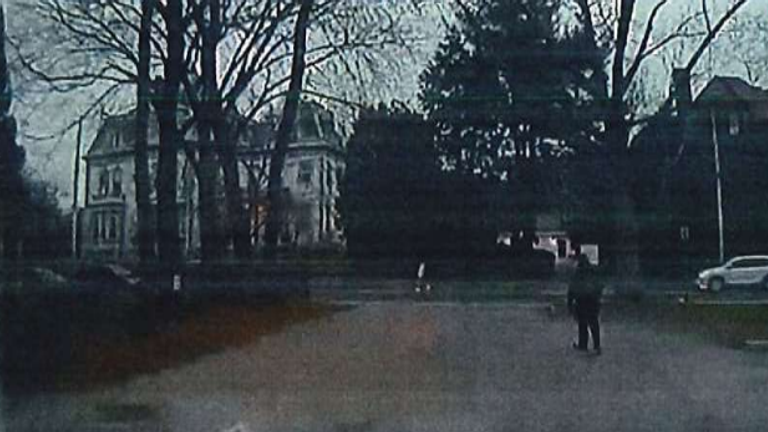 The suspect is seen in the parking lot of the Brown University building. Pic: Rhode Island Attorney General