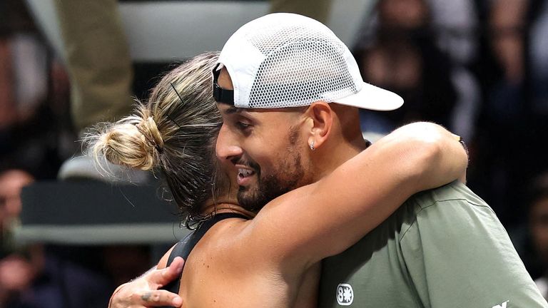 Nick Kyrgios and Aryna Sabalenka embraced at the net at the end of their contest. Pic: Reuters