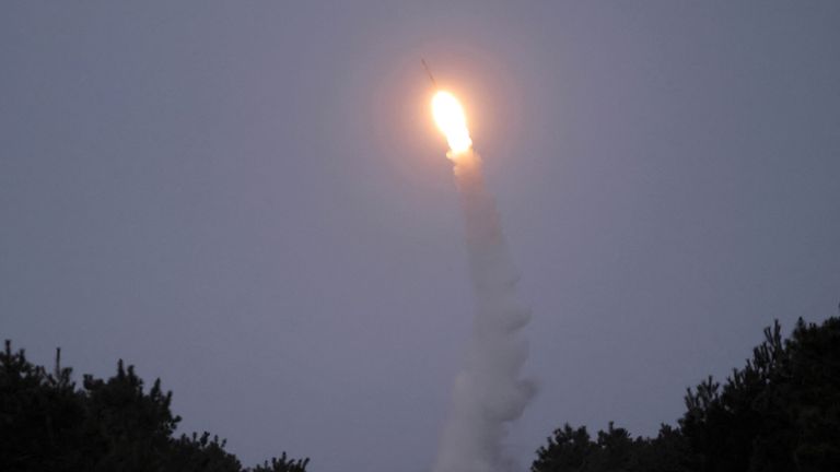 A long-range surface-to-air missile is test-fired near the East Sea.
Pic: KCNA/Reuters