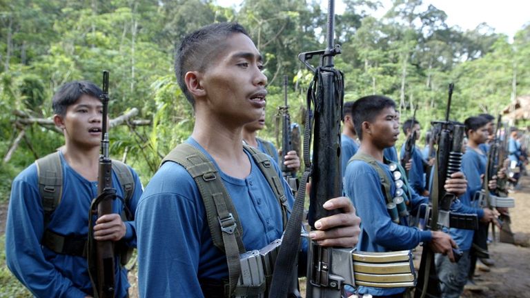 Members of the Filipino New People's Army show their weapons. Pic: Reuters