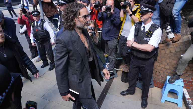 Russell Brand arriving at Southwark Crown Court in May. Pic: PA