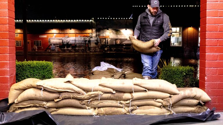 'Catastrophic', life-threatening, floods hitting Washington State, USA 3 Sandbags are placed at the post office in the city of Sultan. Pic: The Seattle Times/AP