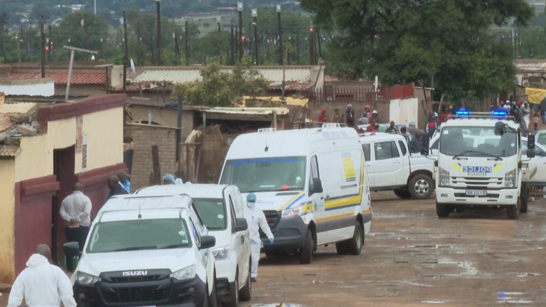 Police at the scene of the shooting. Pic: AP