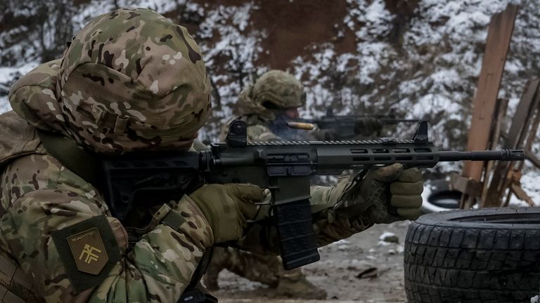 A Ukrainian serviceman in combat practice in Kharkiv region, Ukraine. Pic: Reuters