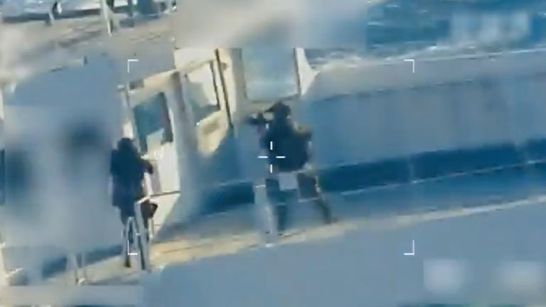 US-Venezuela disaster: The whole lot we find out about dramatic ship seizure 2 Troops are seen with their weapons drawn outside the tanker's bridge. Pic: US Attorney General's Office/X via AP