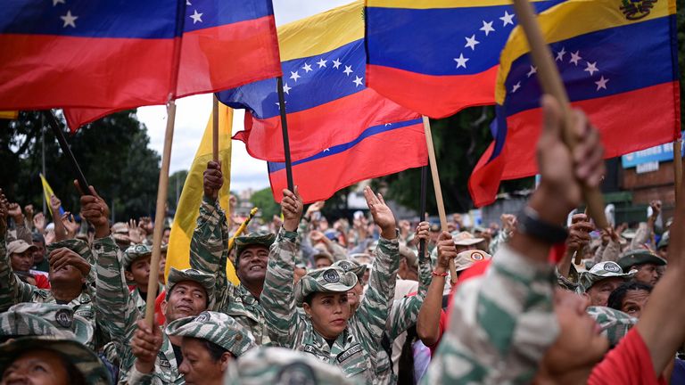 Bolivarian Militia members taking part in a march this week. Pic: Reuters
