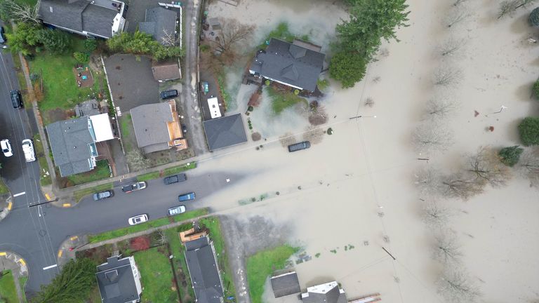 'Catastrophic', life-threatening, floods hitting Washington State, USA 1 The Snoqualmie River floods over its banks at Riverview Park in Snoqualmie. Pic: The Seattle Times/AP