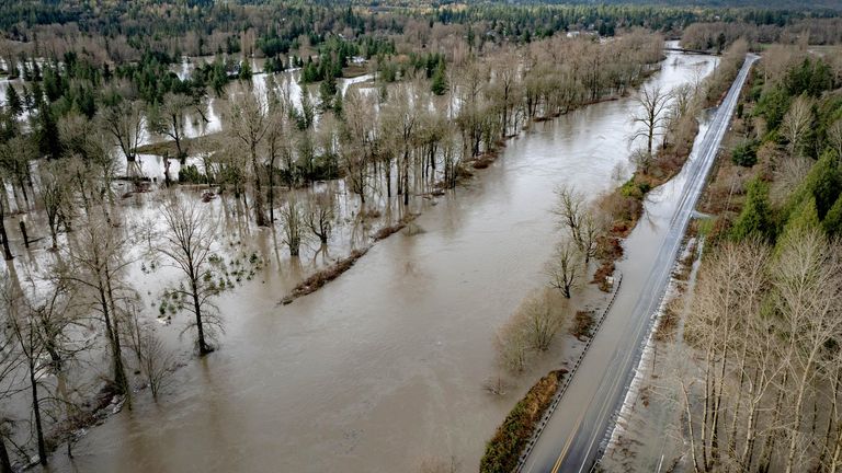 'Catastrophic', life-threatening, floods hitting Washington State, USA 5 A highway near Fall City, is closed after flooding from the Snoqualmie River. Pic: The Seattle Times/AP