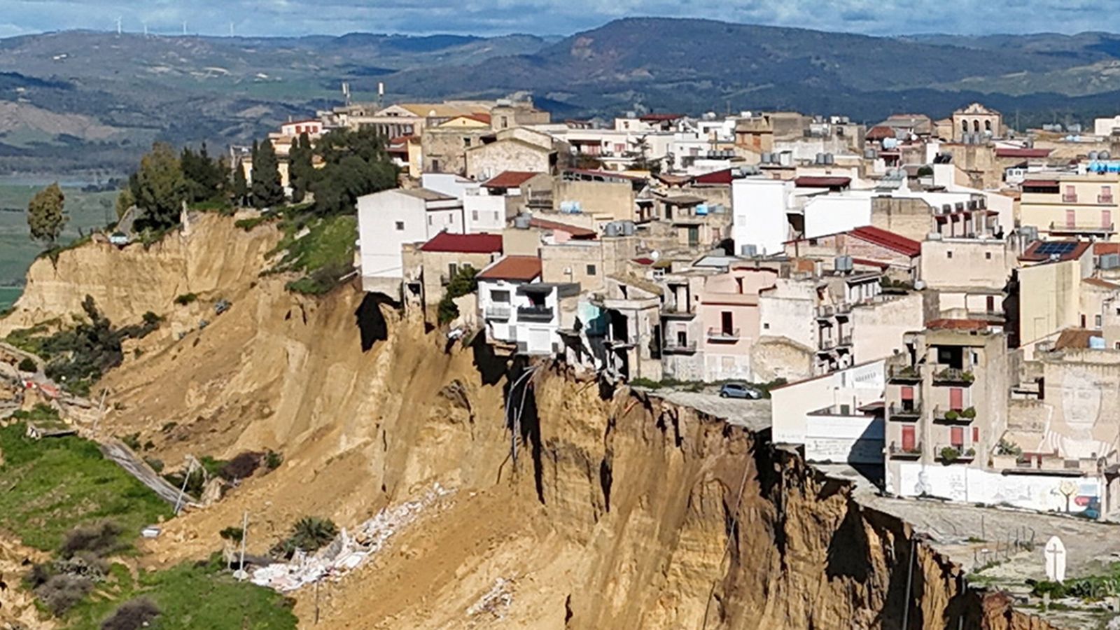 ‘The entire hill is collapsing’: Landslide in Sicily causes homes to fall off cliff edge, 1,500 evacuated
