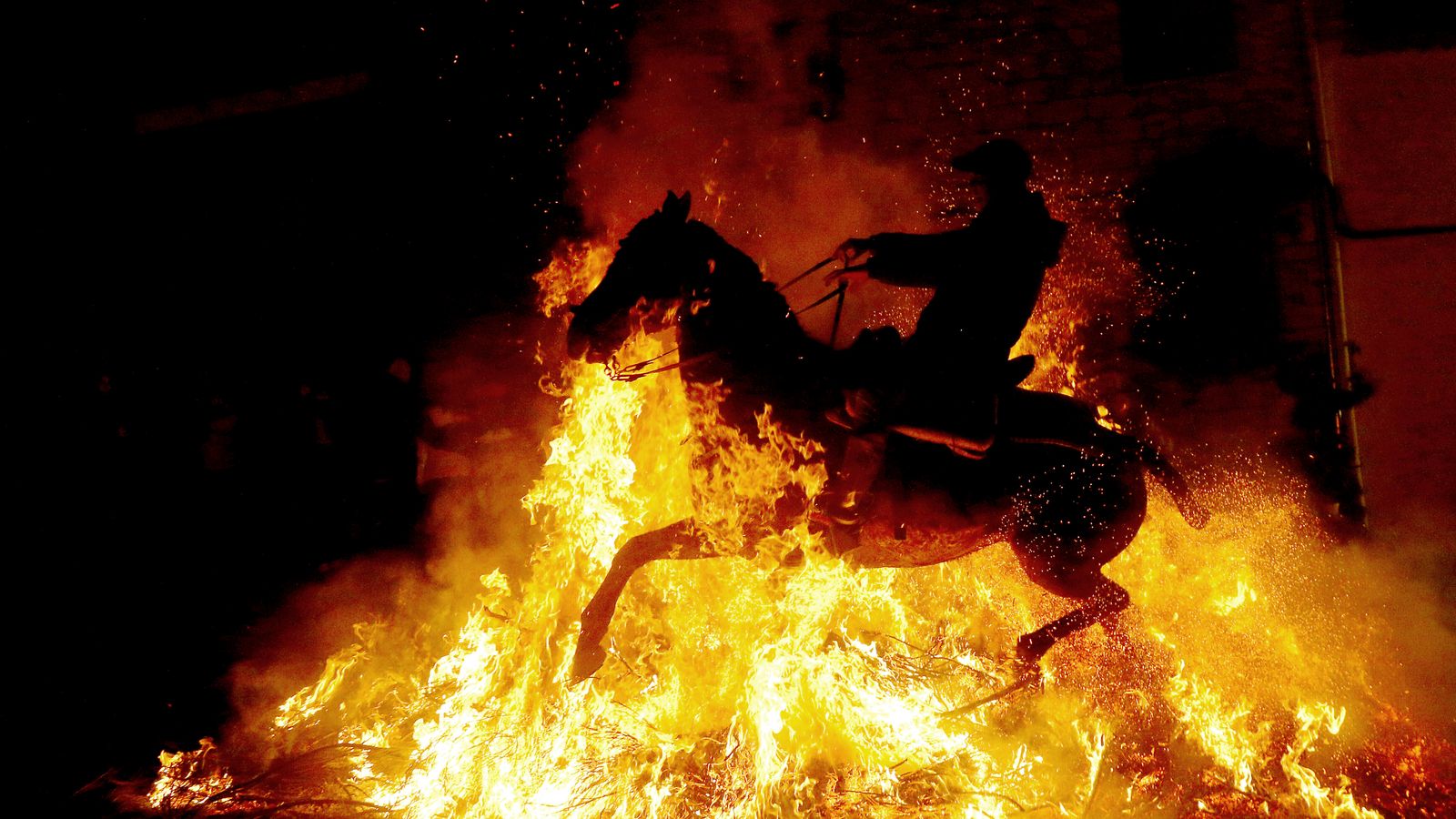 Horses leap through flames in Spanish tradition