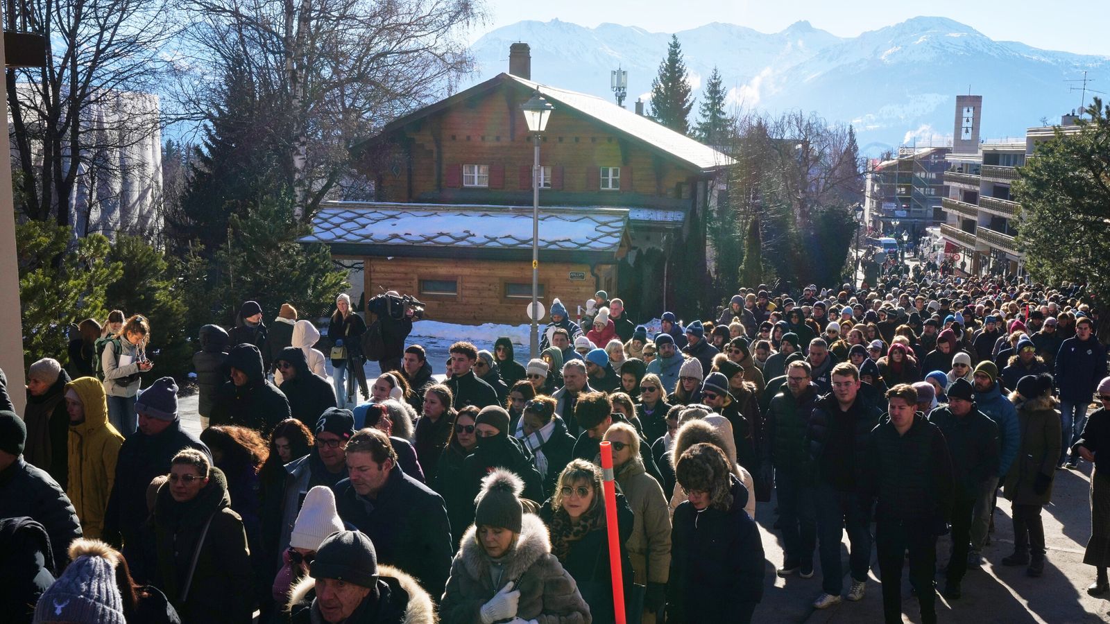 Hundreds march in silence as more Swiss bar fire victims identified