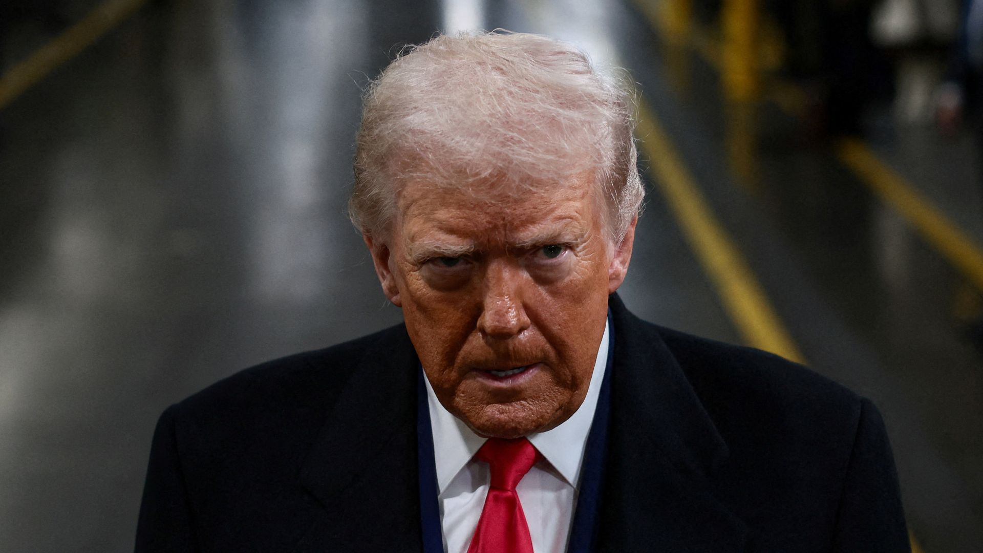 White House defends Trump after video appears to show him swearing at heckler