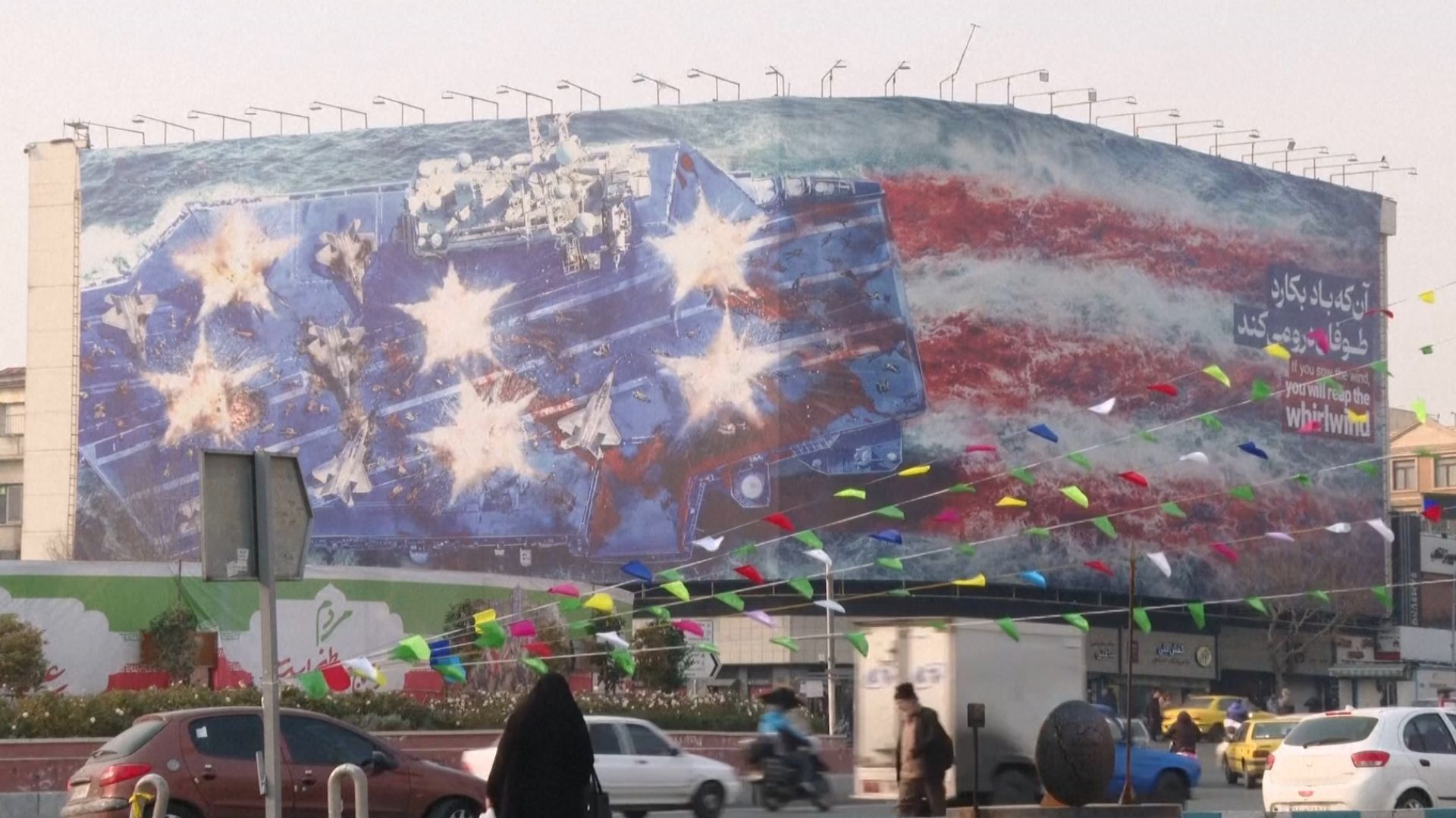 Iran unveils mural warning US not to launch military strike