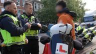 Officers carrying out checks on delivery drivers in Streatham, south London. Pic: Home Office