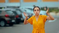 Angry woman in car park